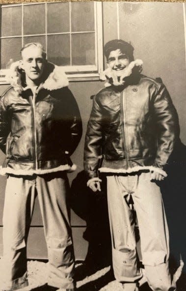 Karnig Thomasian, right, poses in bomber jacket with fellow B-29 bomber crew member Vernon Henning during training in New Mexico.  Henning was one of five crew members who perished when their plane crashed in Burma in December 1944. Thomasian survived by parachuting to safety but was captured by Japanese forces.