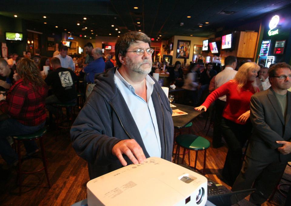 Former Alachua County Republican Party chairman Stafford Jones watches local election results at Gator's Dockside in Gainesville in 2012.