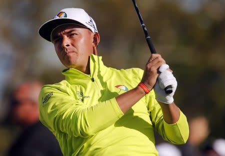 Mar 16, 2018; Orlando, FL, USA; Rickie Fowler hits his tee shot on the 15th hole during the second round of the Arnold Palmer Invitational golf tournament at Bay Hill Club & Lodge . Mandatory Credit: Reinhold Matay-USA TODAY Sports