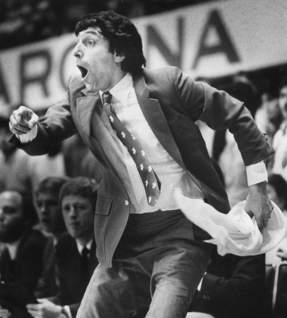 N.C. State coach Jim Valvano reacts to a defensive play by the Wolfpack during their game against Wake Forest in March 1983.