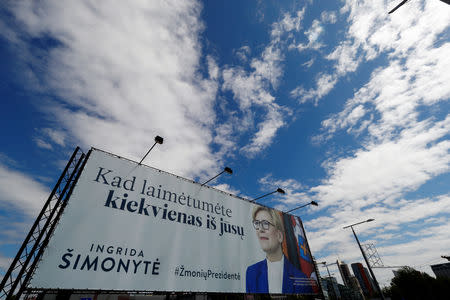 Lithuanian presidential candidate Ingrida Simonyte's campaign placard is seen in Vilnius, Lithuania May 9, 2019. REUTERS/Ints Kalnins