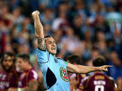 Mitchell Pearce celebrates as the Maroons ponder what could have been.