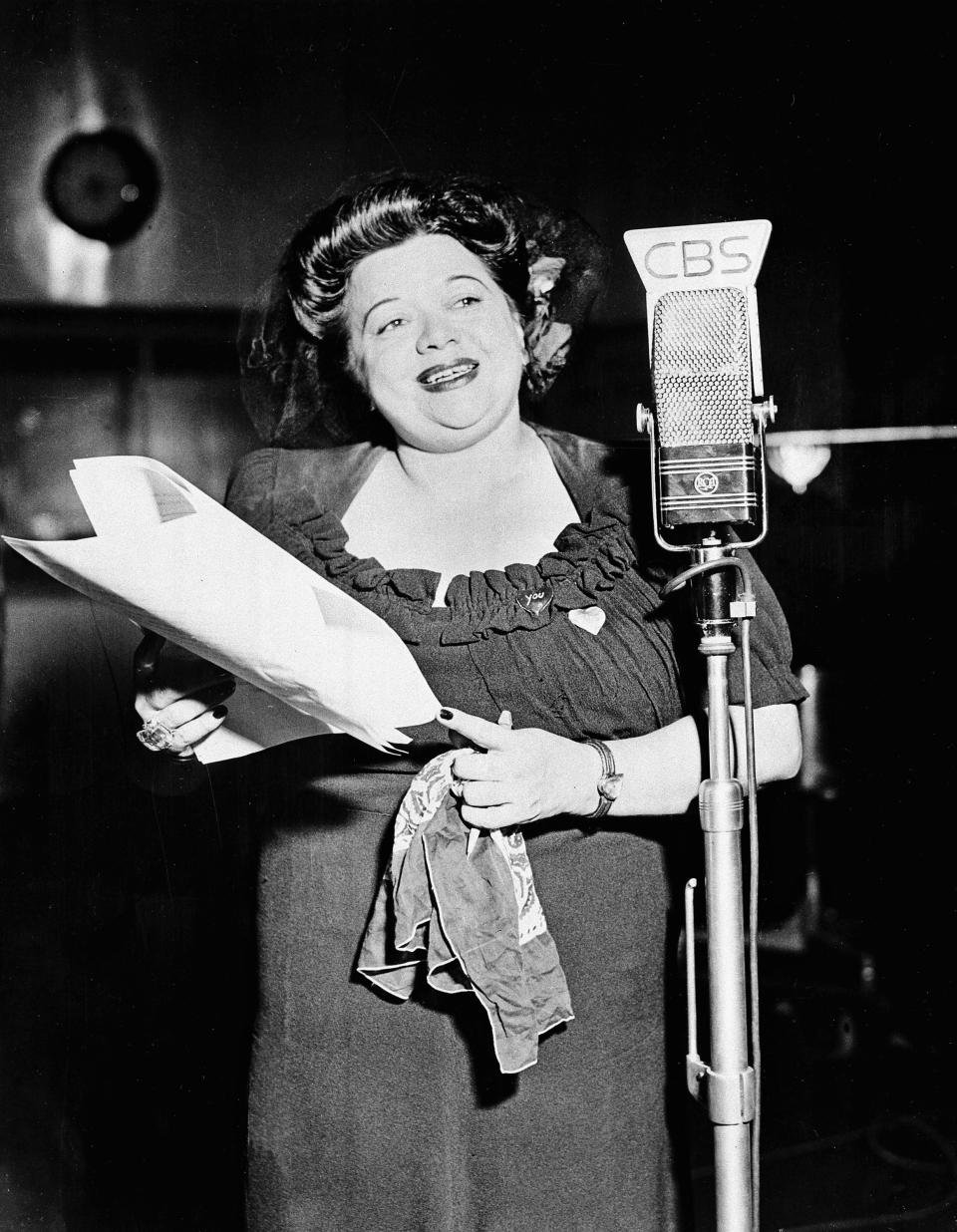 FILE - In this Jan. 1, 1944 file photo, Mildred Bailey, a jazz singer of the Coeur d'Alene American Indian tribe, performs on her musical radio program "Mildred Bailey and Company" in New York City. "RUMBLE: The Indians Who Rocked the World," a new PBS Independent Lens documentary set to air Monday, Jan 21, 2019, shows how Native Americans laid the foundations to rock, blues and jazz. (AP Photo, File)