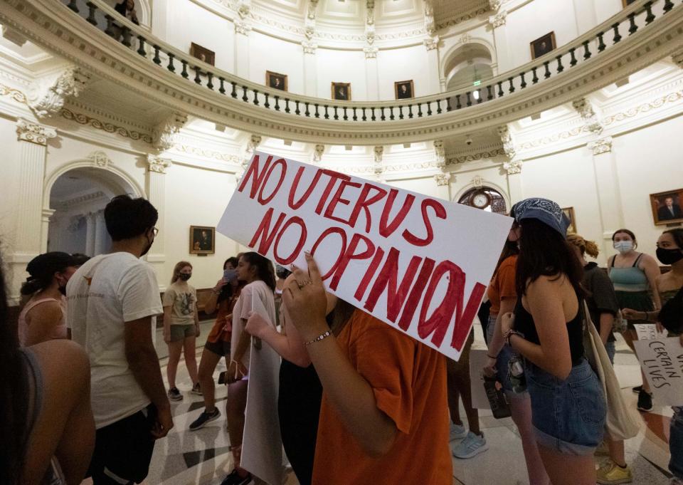 University of Texas women rally at the Texas Capitol to protest Governor Greg Abbott's signing of the nation's strictest abortion law that makes it a crime to abort a fetus after six weeks, or when a "heartbeat" is detected. Abbott signed the law Wednesday, Sept. 1st, 2021.