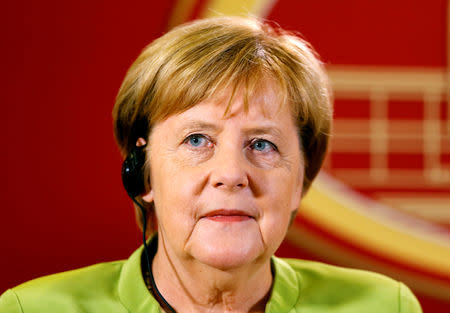 German Chancellor Angela Merkel listens during a news conference in Skopje, Macedonia September 8, 2018. REUTERS/Ognen Teofilovski