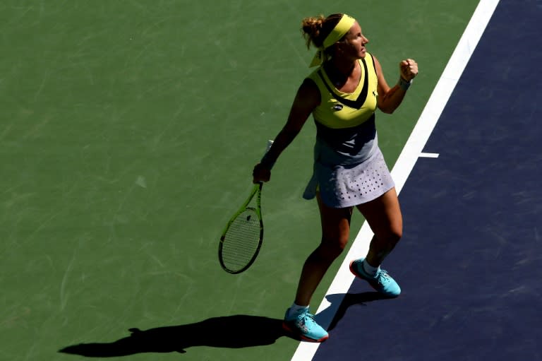 Svetlana Kuznetsova of Russia celebrates a point against Caroline Garcia of France during their BNP Paribas Open last of 16 match, at the Indian Wells Tennis Garden in California, on March 14, 2017