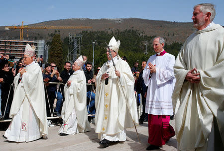 Pope Francis arrives to celebrate a mass in San Giovanni Rotondo, Italy March 17, 2018. REUTERS/Tony Gentile