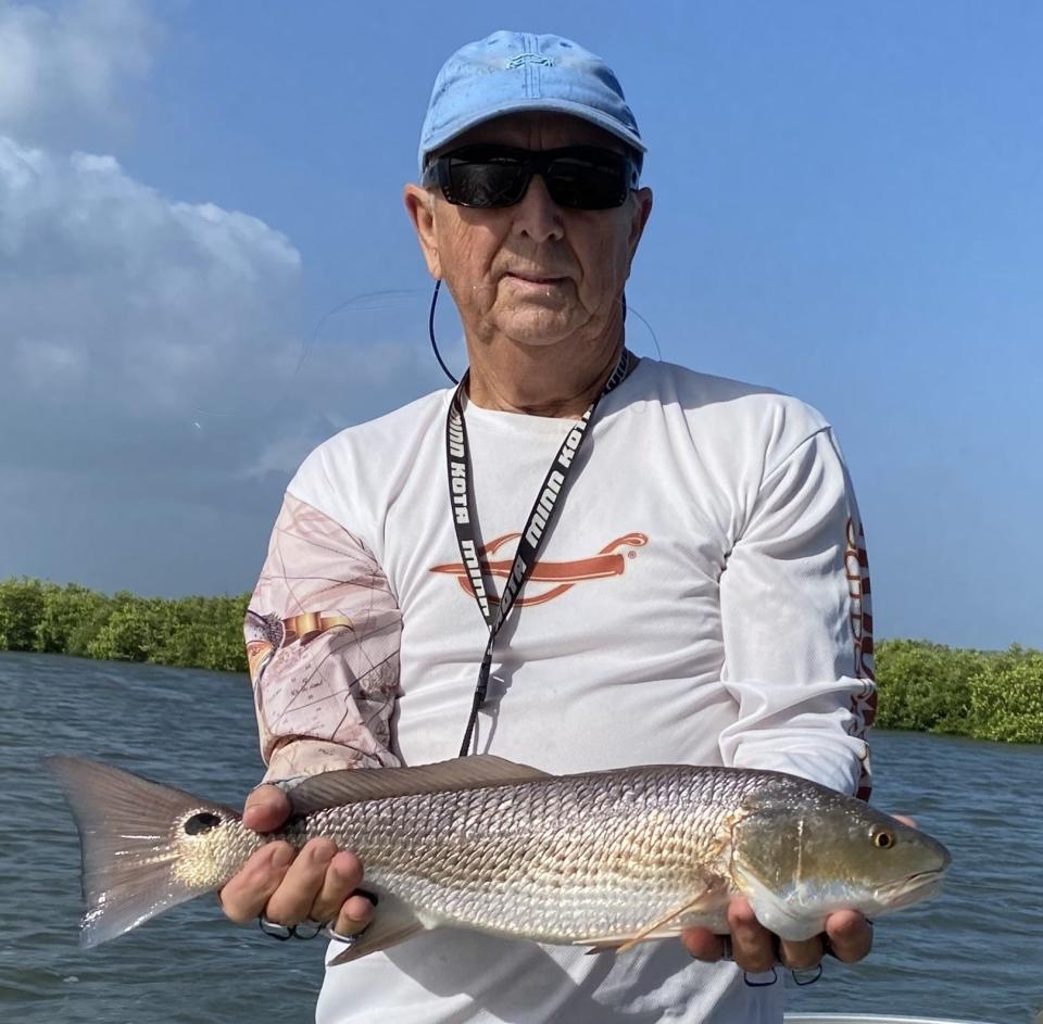 Art Mowery with a nice redfish he caught and released in the Oak Hill area this past week.