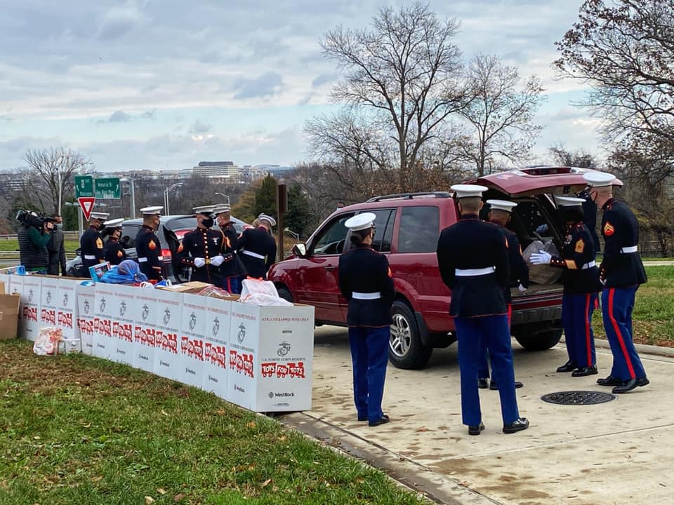 U.S. Marines collect donated goods as part of Toys for Tots, a campaign to provide gifts to children in need at Christmas.