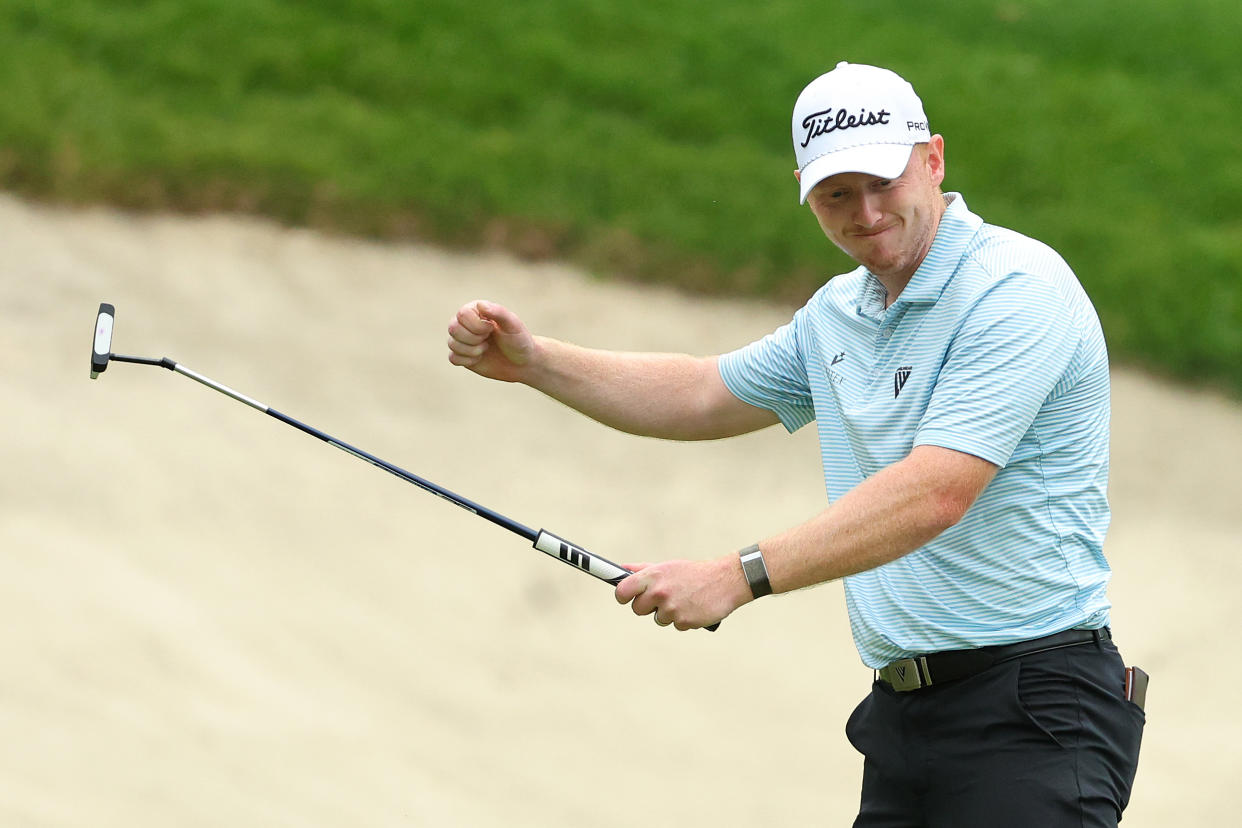 Hayden Springer reacts after a birdie putt on the 18th hole secured his score of 59 in the first round of the John Deere Classic at TPC Deere Run in Silvis, Illinois. (Photo by Stacy Revere/Getty Images)