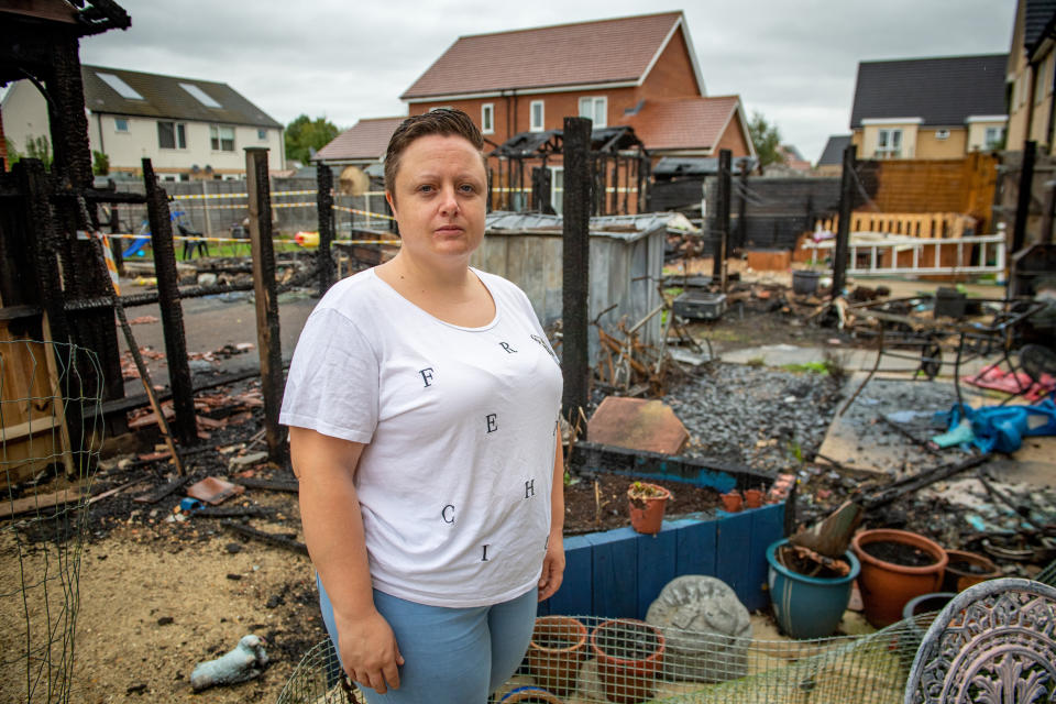 A freak fire left three families homeless after a shard of glass reflected onto a wooden fence (SWNS)