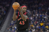 Toronto Raptors forward Pascal Siakam (43) passes the ball against the Golden State Warriors during the first half of an NBA basketball game in San Francisco, Sunday, Nov. 21, 2021. (AP Photo/Jeff Chiu)