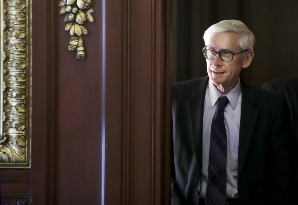 FILE - In this March 21, 2019 file photo, Governor Tony Evers arrives to a ceremony at the State Capitol in Madison, Wis. Gov. Evers made it official Saturday, June 5, 2021, announcing his bid for a second term in the battleground state where he stands as a Democratic block to the Republican-controlled state Legislature.(Steve Apps/Wisconsin State Journal via AP)