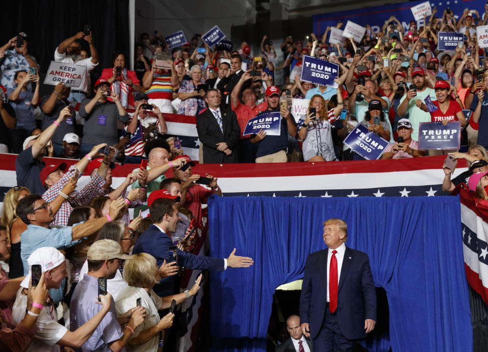 President Donald Trump arrives to speaks at a campaign rally at Williams Arena in Greenville, N.C., Wednesday, July 17, 2019. (AP Photo/Carolyn Kaster)