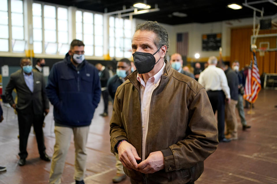 Image: New York Governor Andrew Cuomo walks through a vaccination site after speaking in Brooklyn, N.Y., on Feb. 22, 2021. (Seth Wenig / Pool via Reuters)