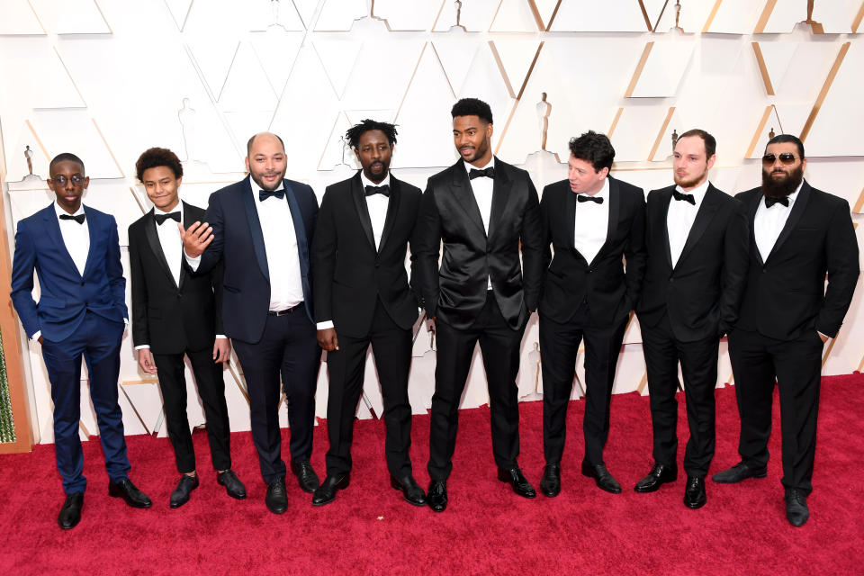 HOLLYWOOD, CALIFORNIA - FEBRUARY 09: French director Ladj Ly (4th from right), actors Djibril Zonga (4th from left), Issa Perica (3rd from left), Alexis Manenti (2nd from right) and cast and crew from "Les Miserables" attend the 92nd Annual Academy Awards at Hollywood and Highland on February 09, 2020 in Hollywood, California. (Photo by Kevin Mazur/Getty Images)