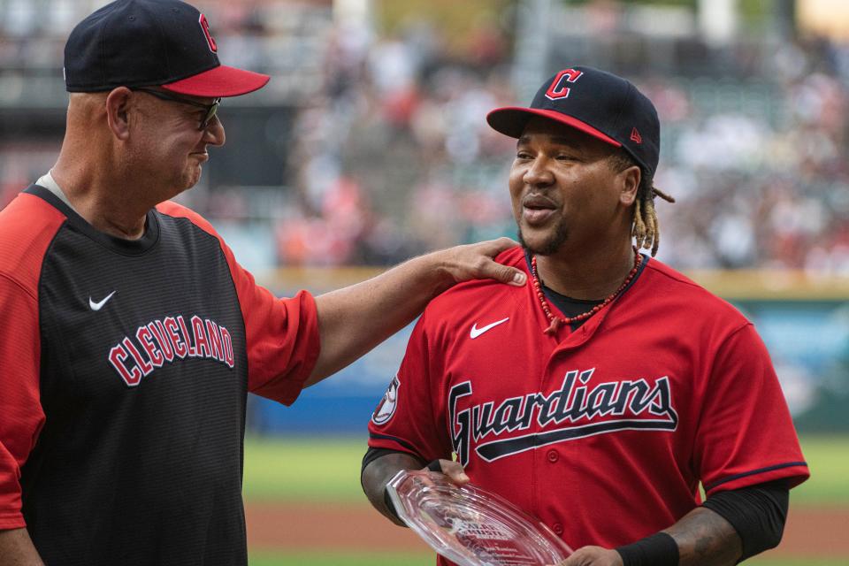 Cleveland Guardians' Jose Ramirez, right is congratulated by Guardians manager Terry Francona after receiving the Major League Players Alumni 2022 Heart & Hustle award before a Sept. 3, 2022, game against the Seattle Mariners in Cleveland.