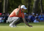 Jordan Spieth lines up a putt on the ninth green during the third round of the PGA Championship golf tournament, Saturday, May 18, 2019, at Bethpage Black in Farmingdale, N.Y. (AP Photo/Julio Cortez)