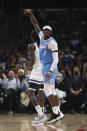 Los Angeles Clippers guard Reggie Jackson (1) reacts after scoring a basket during the first half of an NBA basketball game against the Minnesota Timberwolves in Los Angeles, Saturday, Nov. 13, 2021. (AP Photo/Kyusung Gong)