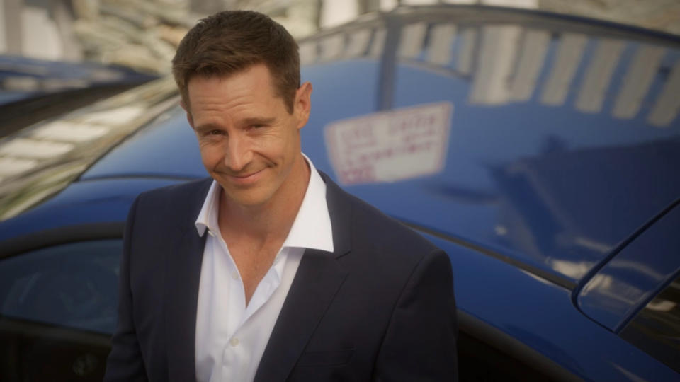 jason dohring about to move a car in "veronica mars"