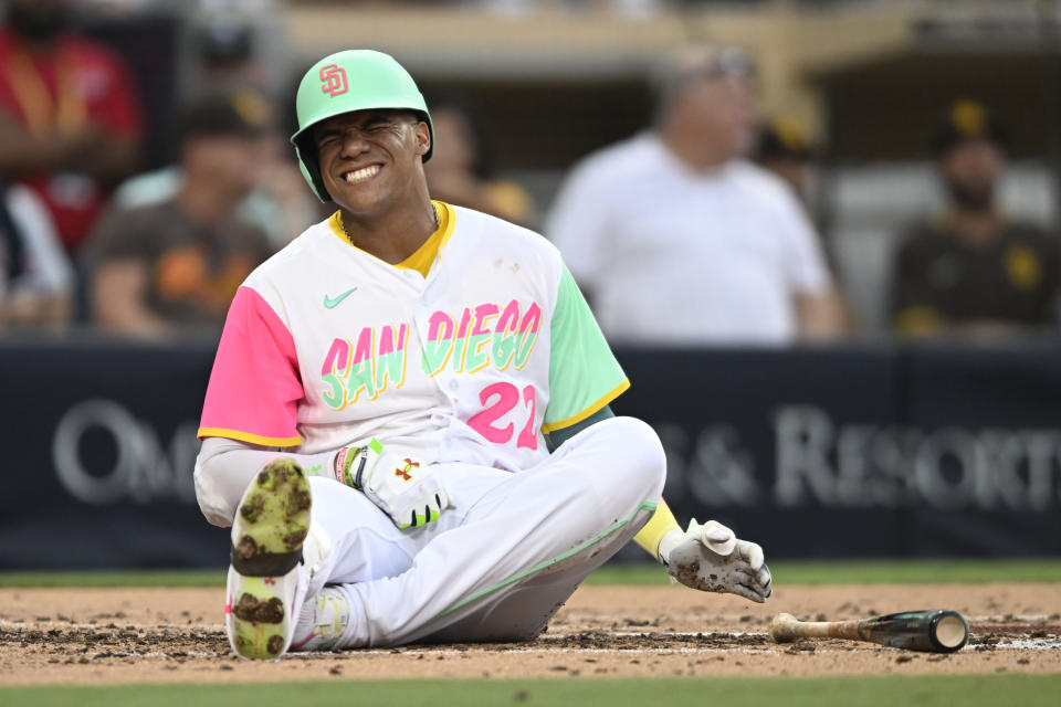 Juan Soto grimaces after being hit in the back by a fastball. (Denis Poroy/Getty Images)