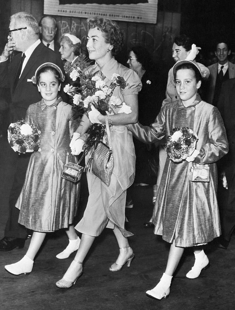 Joan Crawford with her adopted twin daughters