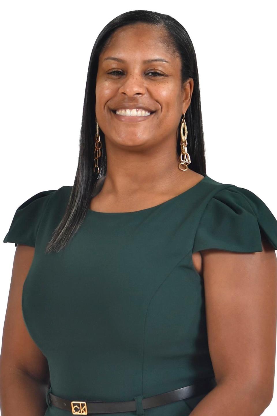 UNCW named Nicole Woods its 12th women's head basketball coach on Thursday, April 13, 2023.