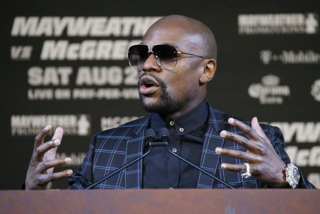 Billionaire Floyd Mayweather, Known for Flaunting Millions in Cash