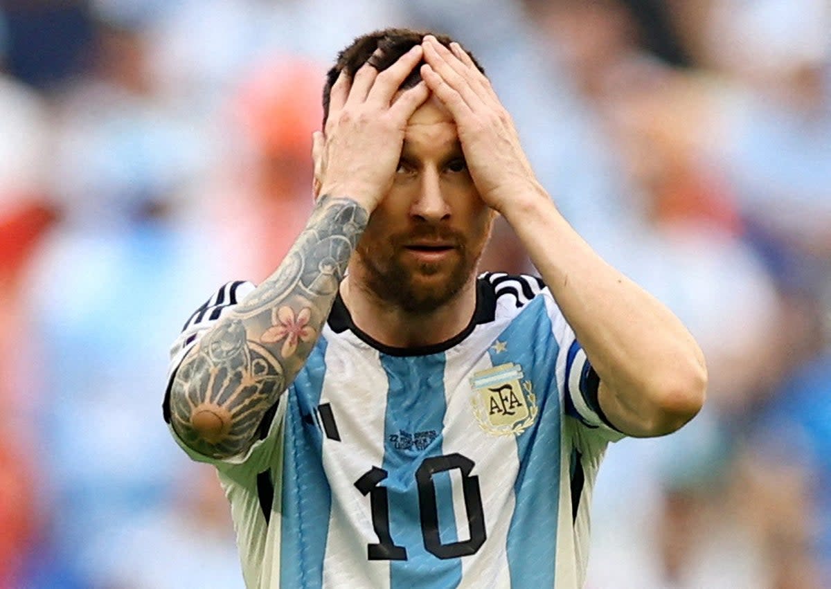 Lionel Messi reacts after his side lost to Saudi Arabia in their opening match (Reuters)