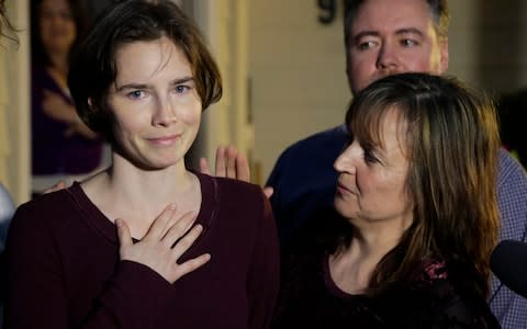 Amanda Knox talking to reporters in Seattle after her definitive acquittal for the murder of Meredith Kercher - Credit: Ted S Warren/AP