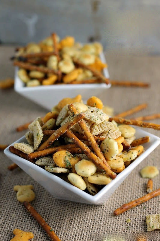 <p>Persnickety Palates</p><p>This delicious party mix is flavored with ranch, dill and can be served with any combination of crackers you have on hand.</p><p><strong>Get the recipe: </strong><a href="https://www.persnicketyplates.com/ranch-cocktail-crackers/" rel="nofollow noopener" target="_blank" data-ylk="slk:Ranch Cocktail Crackers;elm:context_link;itc:0;sec:content-canvas" class="link "><strong>Ranch Cocktail Crackers</strong></a></p>