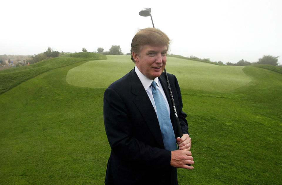 <p>Trump on the 11th green of his newly acquired Ocean Trails Golf Club in Rancho Palos Verdes, Calif., on Nov. 2, 2002.<i> (Photo: Damian Dovarganes/AP)</i> </p>