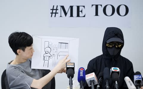 A woman said she experienced at a police station during her detention in Hong Kong - Credit: REUTERS/Thomas Peter