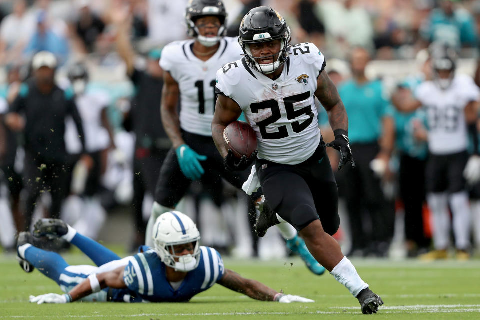 JACKSONVILLE, FLORIDA - SEPTEMBER 18: James Robinson #25 of the Jacksonville Jaguars runs the ball for a touchdown in the second quarter against the Indianapolis Colts at TIAA Bank Field on September 18, 2022 in Jacksonville, Florida. (Photo by Courtney Culbreath/Getty Images)