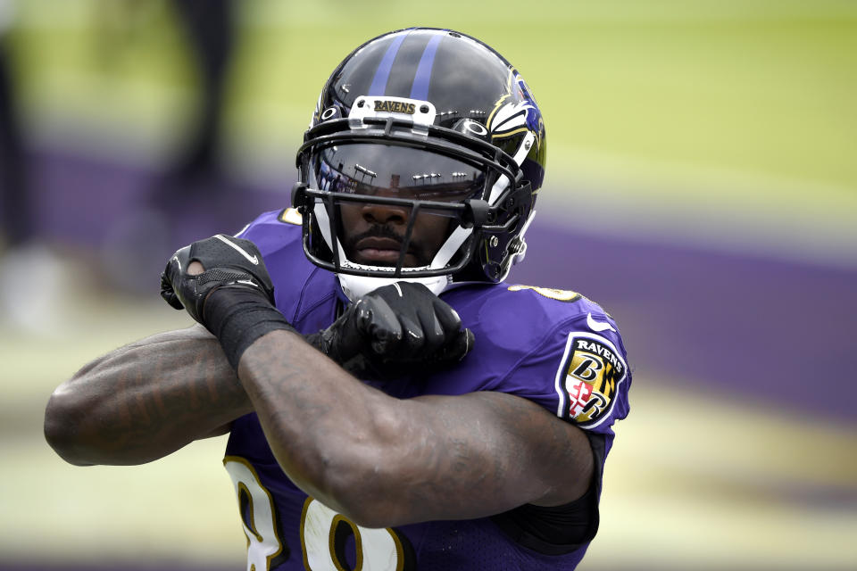 Baltimore Ravens wide receiver Dez Bryant reacts after catching a touchdown pass against the Jacksonville Jaguars during the first half of an NFL football game, Sunday, Dec. 20, 2020, in Baltimore. (AP Photo/Gail Burton)