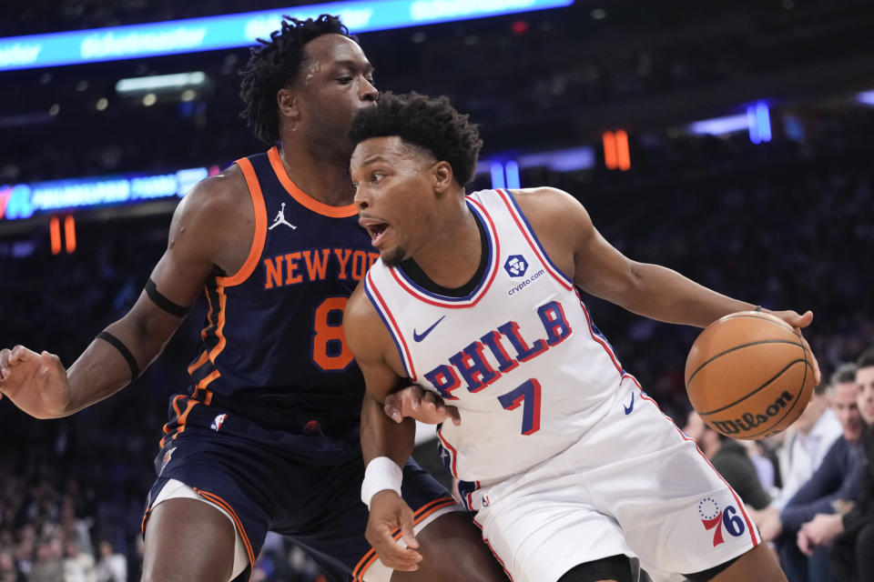 Philadelphia 76ers guard Kyle Lowry (7) drives against New York Knicks forward OG Anunoby (8) during the first half of an NBA basketball game Tuesday, March 12, 2024, at Madison Square Garden in New York. (AP Photo/Mary Altaffer)