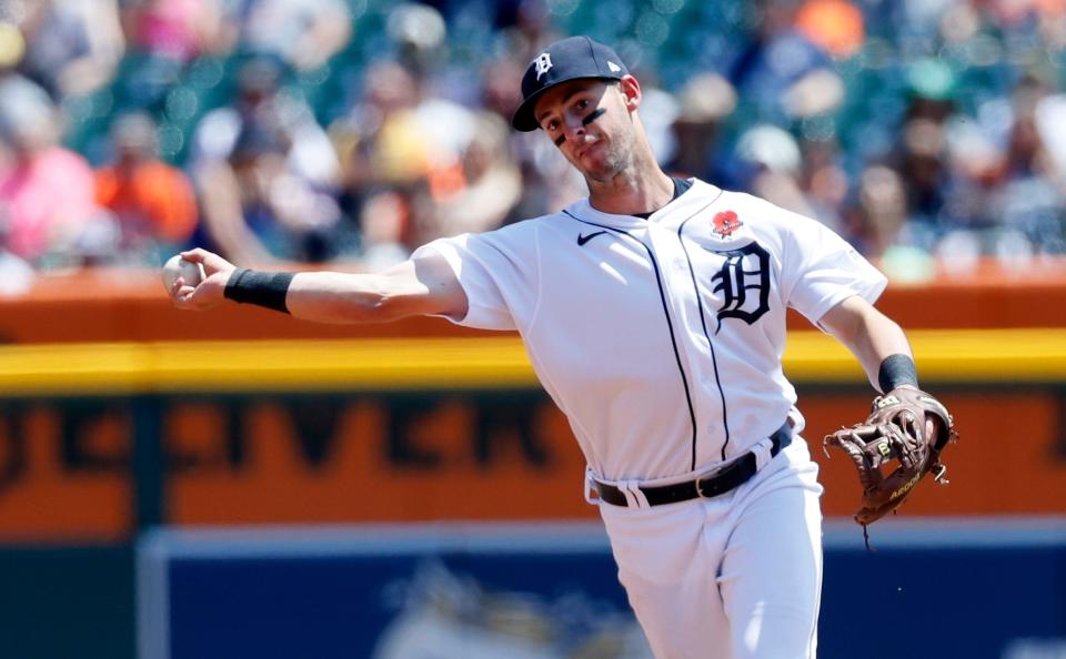 Detroit Tigers third baseman Zack Short throws out Texas Rangers' Nathaniel Lowe at first base during the first inning of a baseball game Monday, May 29, 2023, in Detroit at Comerica Park.