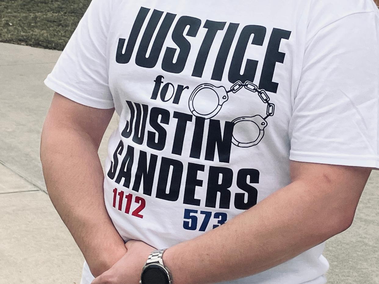 A "Justice for Justin Sanders" T-shirt was at Wright County courthouse on Thursday.