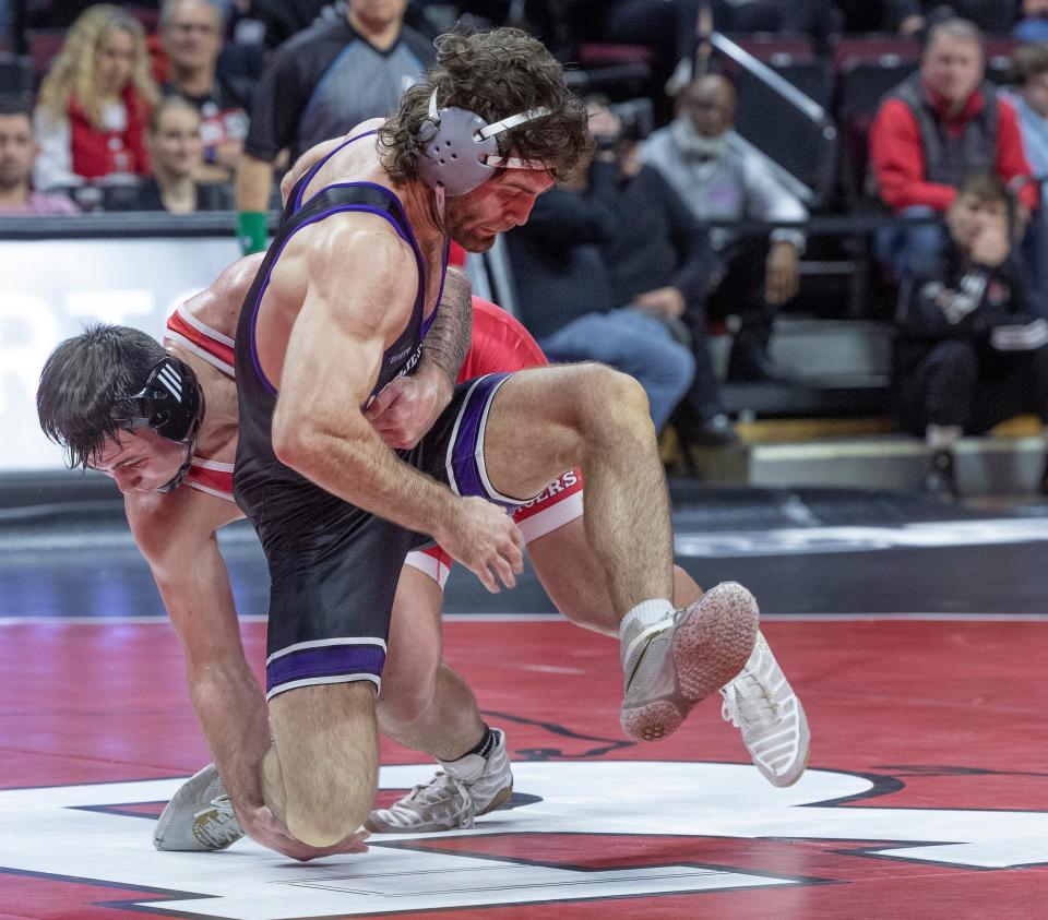 Rutgers' Billy Janzer (back) is the No. 11 pre-seed at 197 pounds in the Big Ten Tournament.