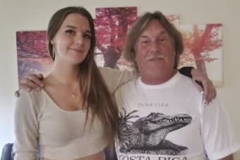 In this September 2021 image provided by Kent Sawyer, Kendra Sawyer poses for a photo with her father Kent Sawyer. Kendra Sawyer took her own life in the Deschutes County jail in Oregon in February 2023, as she was in the throes of opioid withdrawal. A year later, Kent is left wondering whether his daughter, troubled as she was, might still be alive if the jail hadn't failed to provide her with medicine to ease the agony of her withdrawal, as he claimed in a recently filed lawsuit. (Kent Sawyer via AP)