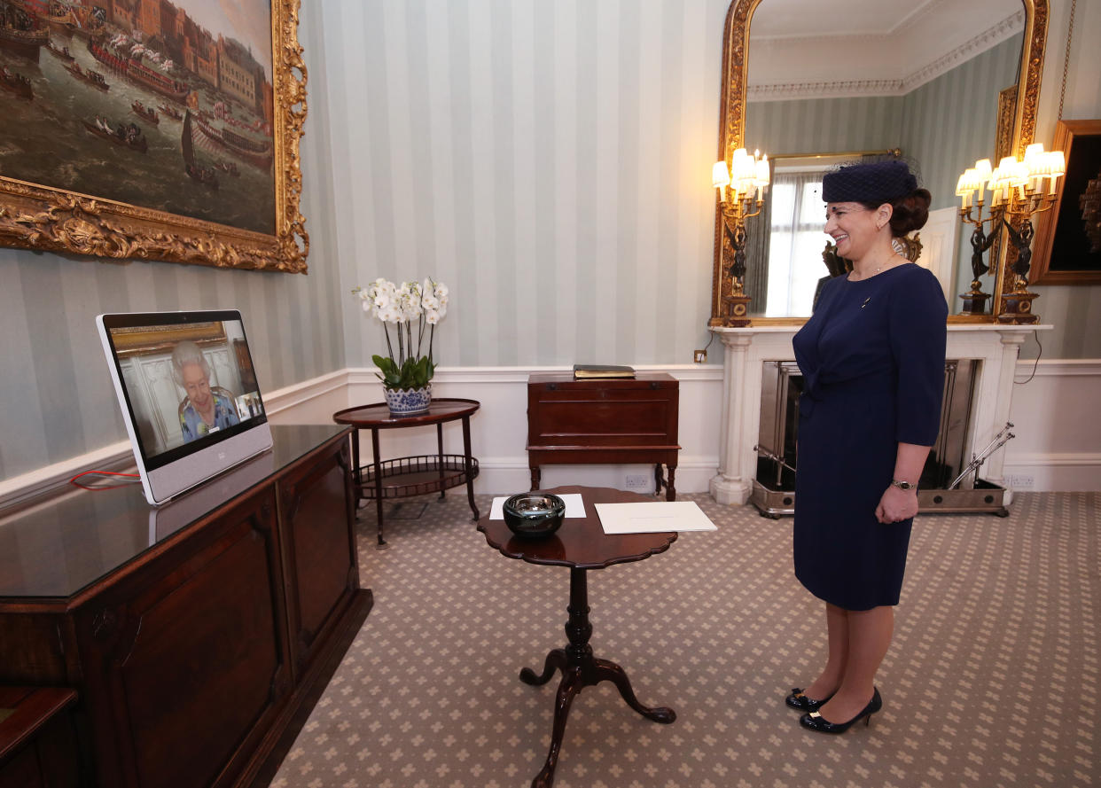 Queen Elizabeth II appears on a screen by videolink from Windsor Castle, where she is in residence, during a virtual audience to receive Her Excellency Ivita Burmistre, the Ambassador of Latvia, at Buckingham Palace, London. Picture date: Tuesday April 27, 2021.