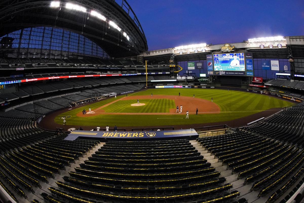 Watch: Man breaks into Brewers' ballpark, attempts to write name using  tractor