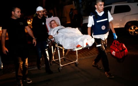 One man was killed and two women were injured in a rocket strike on Ashkelon - Credit: GIL COHEN-MAGEN/AFP/Getty Images