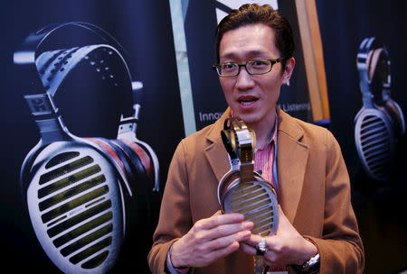 Chinese headphone company Hifiman's Ricardo Yeh speaks about his product during the CanJam headphone and personal audio expo in Singapore February 21, 2016. REUTERS/Edgar Su