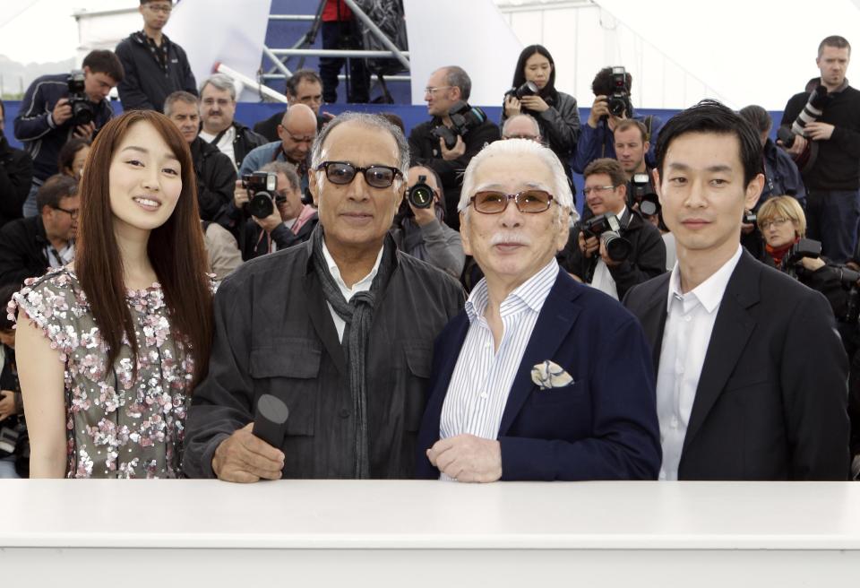 From left actress Rin Takanashi, director Abbas Kiarostami, actors Tadashi Okuno and Ryo Kase pose during a photo call for Like Somone in Love at the 65th international film festival, in Cannes, southern France, Monday, May 21, 2012. (AP Photo/Lionel Cironneau)