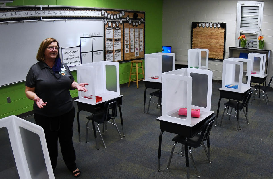 Cheryl Nicholas, Principal of Layer Elementary School, explains to the media the social distancing and other health precautions that have been initiated at the school a week before classes begin for the year during the COVID-19 pandemic on August 10, 2020 in Winter Springs, Florida. Classrooms will be limited to 15 students and desks fitted with shields will be appropriately spaced. (Photo by Paul Hennessy/NurPhoto via Getty Images)