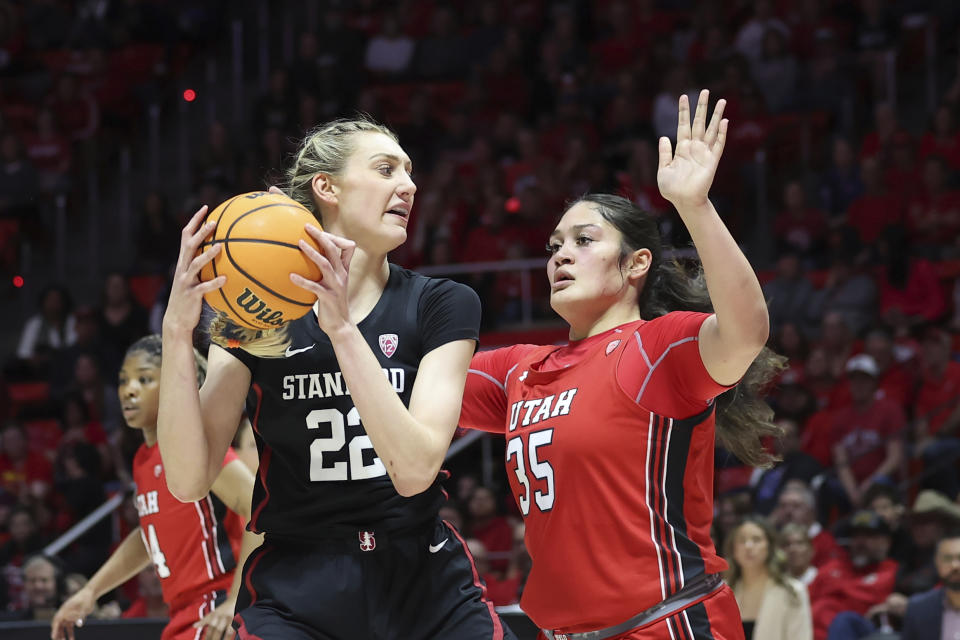 Stanford forward Cameron Brink (22) posts up against Utah forward Alissa Pili (35) in the first half of an NCAA College Basketball Game Saturday, Feb. 25, 2023, in Salt Lake City. (AP Photo/Rob Gray)