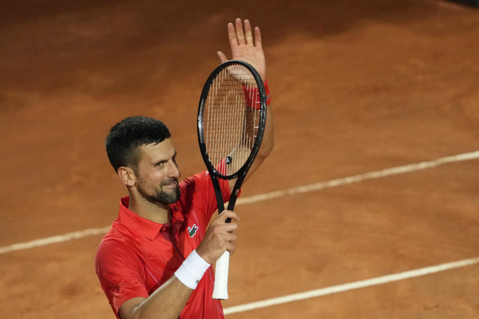 Serbia's Novak Djokovic celebrates after winning a match against France's Corentin Moutet at the Italian Open tennis tournament in Rome, Friday, May 10, 2024. (AP Photo/Alessandra Tarantino)