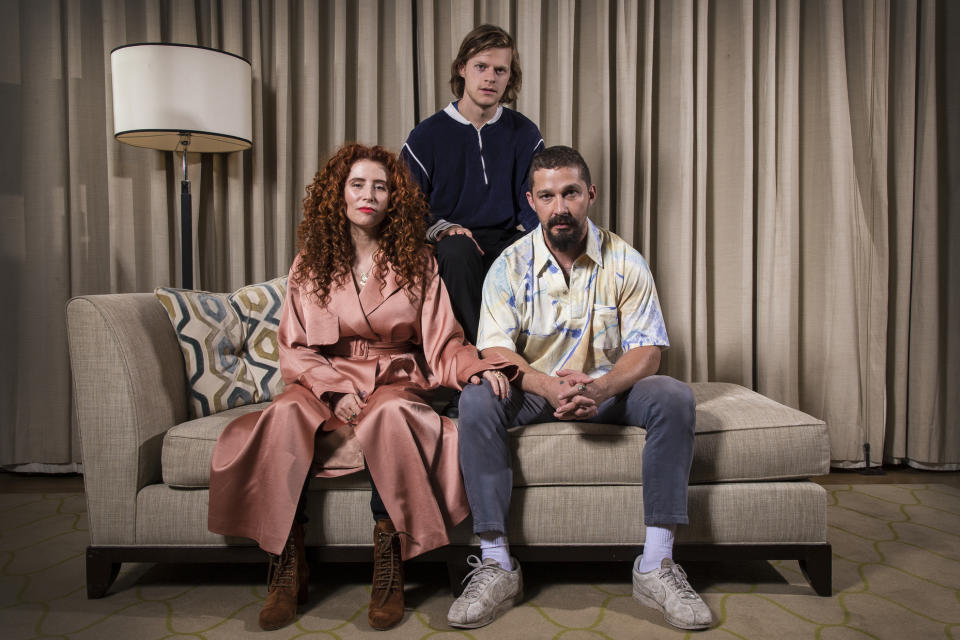 This Oct. 5, 2019 photo shows, from left, director Alma Har'el, actor Lucas Hedges and actor Shia LaBeouf posing for a portrait to promote their film "Honey Boy" during the London Film Festival. (Photo by Joel C Ryan/Invision/AP)