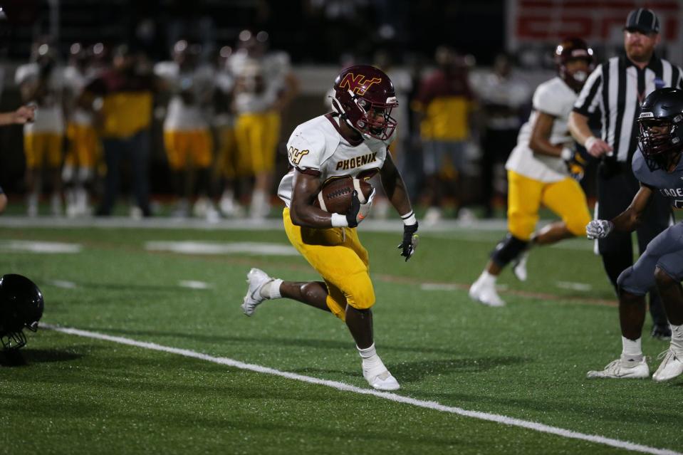 New Hampstead running back Samari Dowdy finds some running room against the Benedictine defense during Friday night's game.